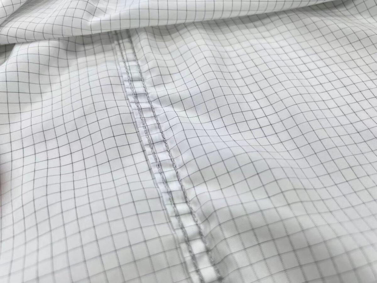 How ESD uniforms work with conductive fibers to protect sensitive electronics