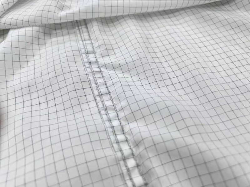 How ESD uniforms work with conductive fibers to protect sensitive electronics